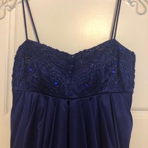 Short purple party dress with with sequin top